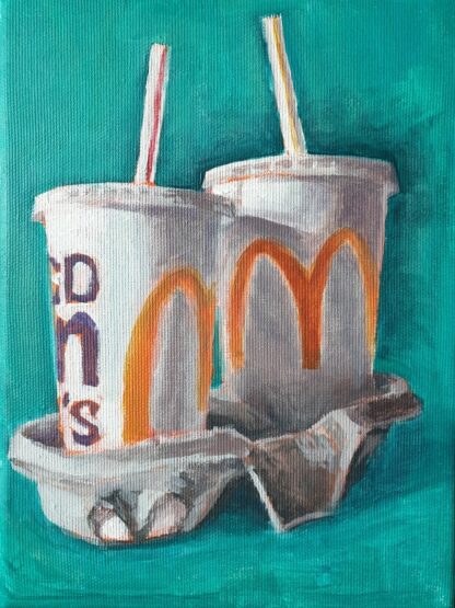 Milkshake speed painting by Bart Carels showing two McDonald's cups in teal background