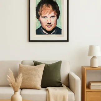 Ed Sheeran art print displayed in a modern Scandinavian living room above a sofa