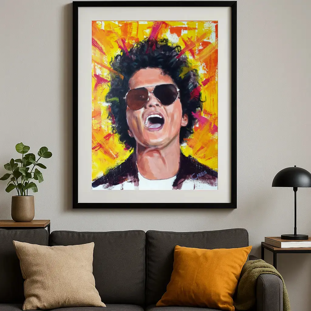Bruno Mars painting and art print displayed in a modern living room above a sofa
